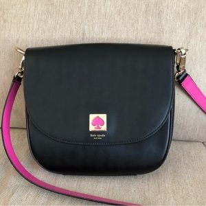 Kate Spade cross body handbag. Beautiful pink accent in excellent condition.